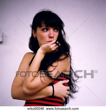 rest on, pony haircut, red-black, crossed arms, woman, half-length, shirt View Large Photo Image Stock Photograph - rest on, pony haircut, red-black, crossed arms, woman, half-length, shirt. Fotosearch