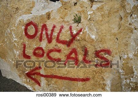 Stock Photo - Sardinia, restricting, restriction, Locals, fingerpost, marker, sign. Fotosearch