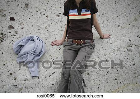 sitting, sits, young, woman, girl, abandoned, lonely View Large Photo Image Stock Image - sitting, sits, young, woman, girl, abandoned, lonely. Fotosearch