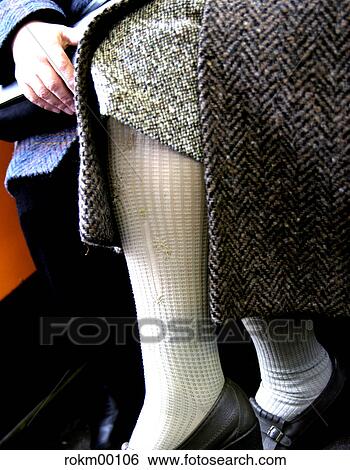 skirt, subway, socks, poverty, patched, legs, feet View Large Photo Image Stock Photograph - skirt, subway, socks, poverty, patched, legs, feet. Fotosearch