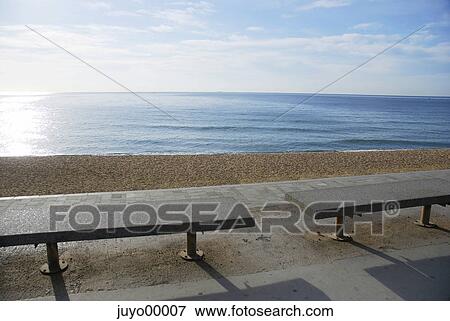 Spain, beach, sea, quiet, negative space, blue, bench View Large Photo Image Stock Photo - Spain, beach, sea, quiet, negative space, blue, bench. Fotosearch