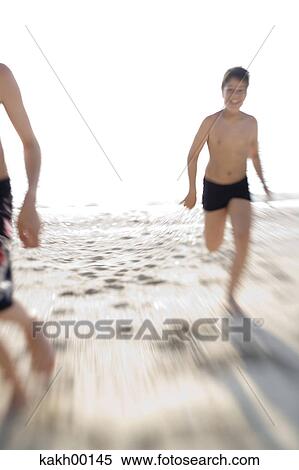 Stock Photography - summer, fun, high key, desire, beach, summers, joy. Fotosearch