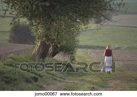 summery, summerly, cartway, walk, promenade, woman, adults View Large Photo Image Stock Photo - summery, summerly, cartway, walk, promenade, woman, adults. Fotosearch