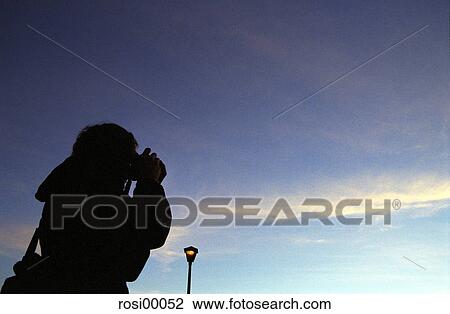 sunset, hobby photographer, man silhouette, photograph View Large Photo Image Stock Image - sunset, hobby photographer, man silhouette, photograph. Fotosearch