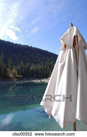 umbrella, mountain world, lake, sunshade, sky, blue, sun View Large Photo Image Stock Image - umbrella, mountain world, lake, sunshade, sky, blue, sun. Fotosearch