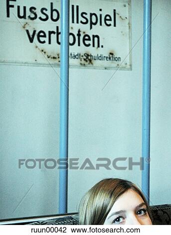 Stock Image - woman, cafe, young woman, football, soccer, sign, gym. Fotosearch