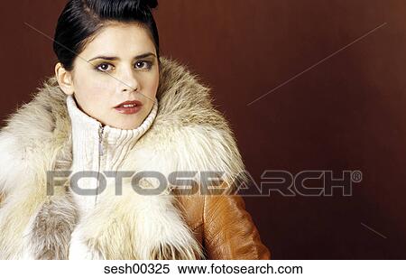 woman, human, fur, dark hair, lipstick, face, visage View Large Photo Image Stock Photography - woman, human, fur, dark hair, lipstick, face, visage. Fotosearch