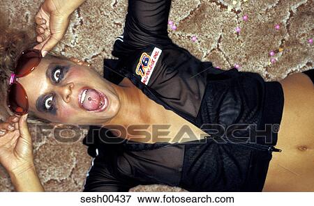 woman, human, lying, piercing, pierced, make-up View Large Photo Image Stock Photo - woman, human, lying, piercing, pierced, make-up. Fotosearch