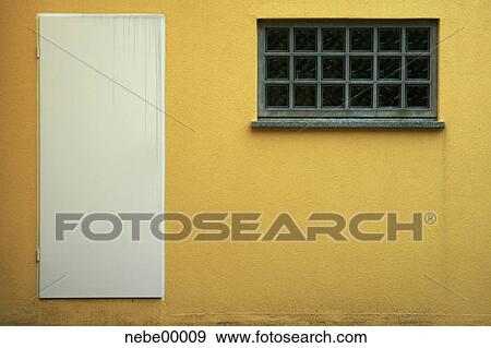 Stock Photo - yellow, door, window, windows, minimal, entrance, access. Fotosearch
