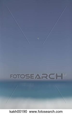 Stock Image - beach, sea, waves, surge, breakers, wind, weather. Fotosearch