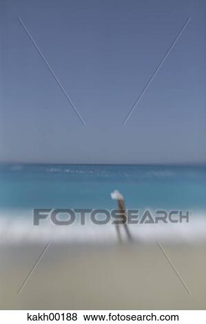 Stock Photo - beach, sea, waves, surge, breakers, wind, weather. Fotosearch
