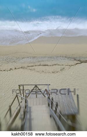Stock Photo - beach, stairs, stair, railing, balustrade, handrail, wood. Fotosearch