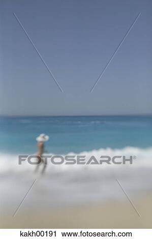 beach, woman, hat, holiday, leave, blue, sea View Large Photo Image Stock Image - beach, woman, hat, holiday, leave, blue, sea. Fotosearch