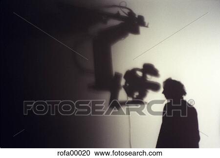Stock Image - behind-the-scenes, DIRECTION, shadow play, director, feature, high-end equipment, backstage. Fotosearch