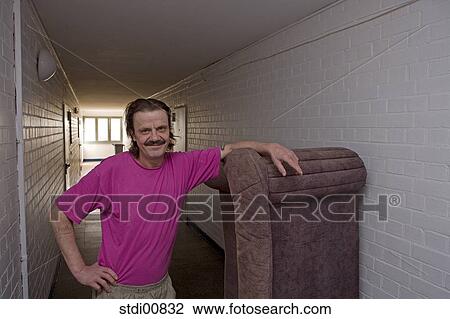 Stock Image - benefit, tattoo, impoverishment, loneliness, isolation, corridor. Fotosearch