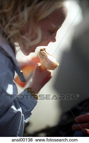 blue jacket, blonde long hair, girl, hand, happy moment, ice cream, lass View Large Photo Image Stock Photo - blue jacket, blonde long hair, girl, hand, happy moment, ice cream, lass. Fotosearch