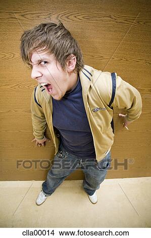 brown hair, open mouth, shirt, young, sport shoes, jacket View Large Photo Image Picture - brown hair, open mouth, shirt, young, sport shoes, jacket. Fotosearch