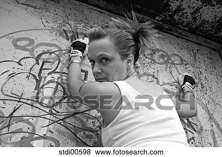 Stock Photo - build-up of muscles, teddy, strength training, bodybuilding, woman, portrait, arms. Fotosearch
