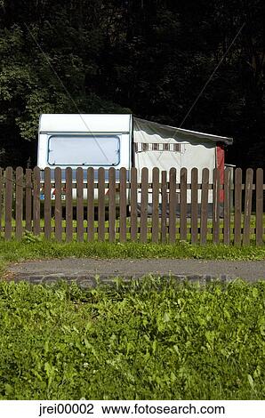 camping, trailer, caravan, tent, campsite, rustic fence, holidays View Large Photo Image Stock Image - camping, trailer, caravan, tent, campsite, rustic fence, holidays. Fotosearch