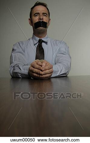 captivation, human, business secret, manager, businessman, speechless, dumb View Large Photo Image Stock Image - captivation, human, business secret, manager, businessman, speechless, dumb. Fotosearch
