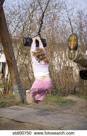 Stock Image - child, playing children, children, laugh, pools, head, eyes. Fotosearch