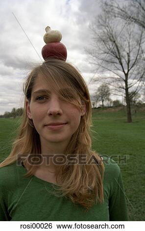 Stock Photograph - eat, brightens hair, food, face, apple, mushroom, young woman. Fotosearch