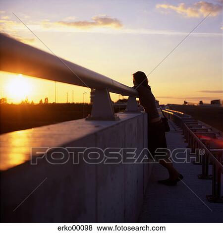 evening, standing, full body, silhouette, vanilla sky, sunset, sunset glow View Large Photo Image Stock Photo - evening, standing, full body, silhouette, vanilla sky, sunset, sunset glow. Fotosearch