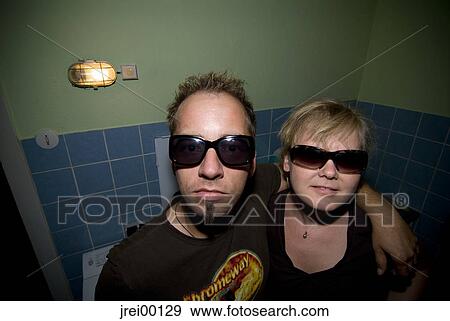 Stock Photo - eyeglasses, shirt, urban, human, humans, woman. Fotosearch