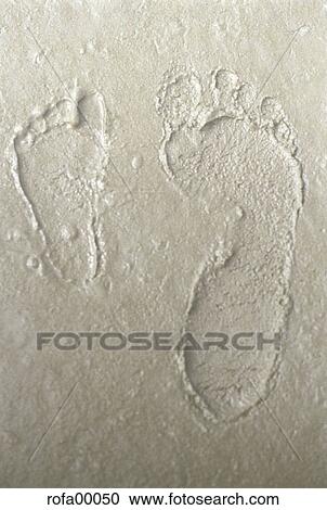 Stock Image - feet, beach, print, imprint, trace, trail, sole. Fotosearch