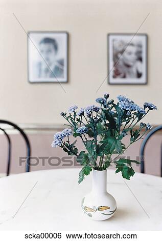Stock Photograph - flowers, cornflower, decoration, light blue, table, white, marble table. Fotosearch