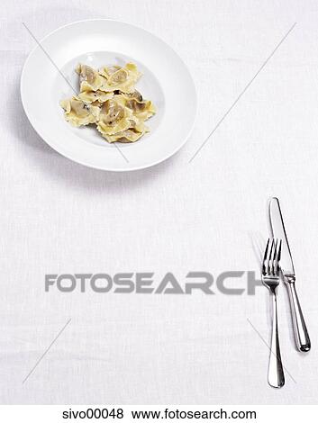 formal dinner, food, pasta, ravioli, mushroom, mushroom stuffing, cutlery View Large Photo Image Stock Photo - formal dinner, food, pasta, ravioli, mushroom, mushroom stuffing, cutlery. Fotosearch