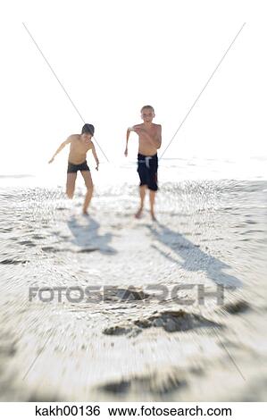 fun, happy, high key, desire, beach, sun, luck View Large Photo Image Stock Photograph - fun, happy, high key, desire, beach, sun, luck. Fotosearch
