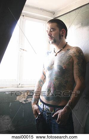 half body, tattoo, window, windows, reflective, pensive View Large Photo Image Stock Photography - half body, tattoo, window, windows, reflective, pensive. Fotosearch