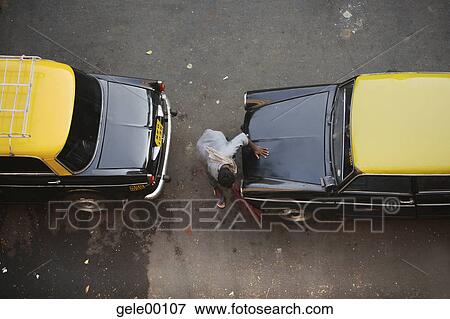 India, autos, developing country, city live, city life, job, Asia View Large Photo Image Stock Photo - India, autos, developing country, city live, city life, job, Asia. Fotosearch