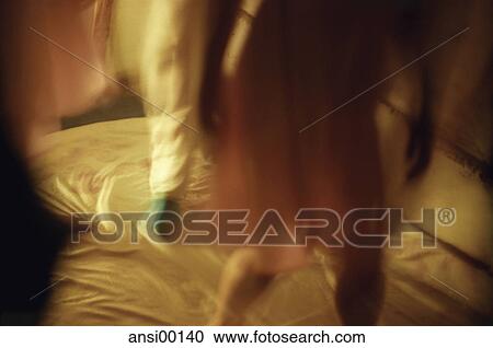 Stock Image - indoor photo, arms, warm light, inside, yellow, contour, contours. Fotosearch