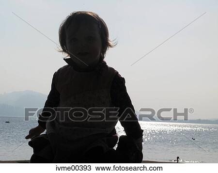 Stock Image - infant, alameda, lake, shade, shadow, contour, back light. Fotosearch