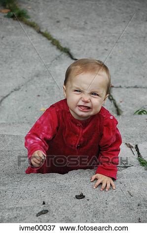 Stock Photo - infant, little dress, girl, stairs, rise, cowering, huddling. Fotosearch
