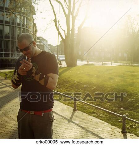 Stock Photography - masculine, summers, town, mood, street, on the road, on the street. Fotosearch