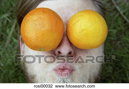 Stock Image - meadow, bright, caucasian, frontal, direct, oranges, healthy. Fotosearch