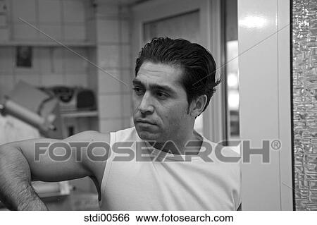 Stock Photograph - muscleman, teddy, build-up of muscles, strength training, bodybuilding, arms. Fotosearch
