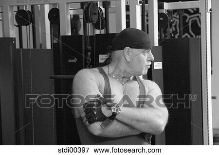 Stock Photo - muscles, biceps, training, training tool, bodybuilding, arms. Fotosearch