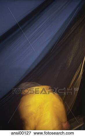 Stock Photo - night fishing, dedication, LABOUR, hard work, commitment, night photograph, aboard. Fotosearch