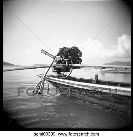 Stock Photo - outboard motorboat, holidays, outboard engine, boat, vacation, Thailand, fishing boat. Fotosearch