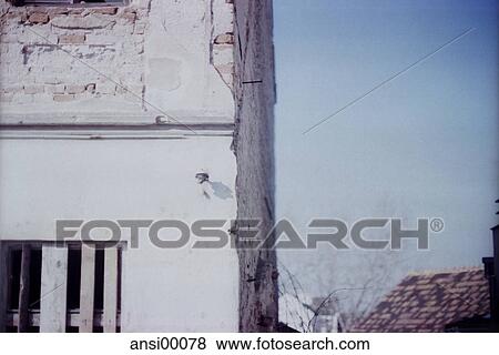 Stock Photo - outdoor shot, renovation, outside, house, corner of a house, edge, corner. Fotosearch