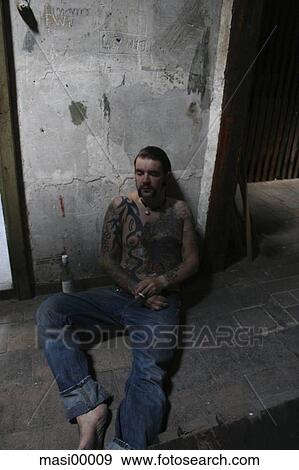 pause, tattoo, cigarette, hope, sitting, expectant View Large Photo Image Stock Photo - pause, tattoo, cigarette, hope, sitting, expectant. Fotosearch