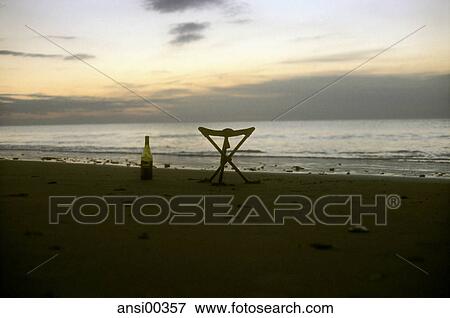 sand, sandy beach, empty, camp chair, chill out, Chill-Out, tripod View Large Photo Image Stock Photo - sand, sandy beach, empty, camp chair, chill out, Chill-Out, tripod. Fotosearch