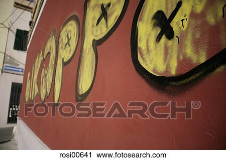Stock Image - Sardinia, graffiti, city, town, urban, vandalism, multicolored. Fotosearch