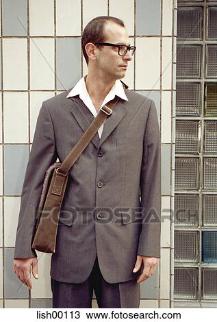 shoulder bag, suit, elegant, pocket, bag, humans View Large Photo Image Stock Image - shoulder bag, suit, elegant, pocket, bag, humans. Fotosearch