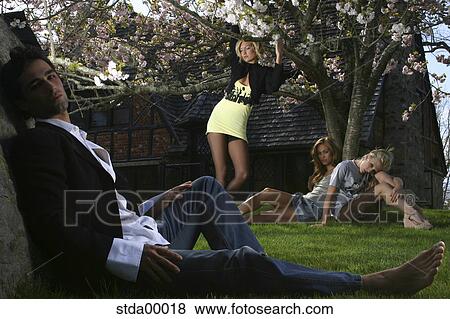 squad, group, woman, meadow, stone, persons View Large Photo Image Stock Photo - squad, group, woman, meadow, stone, persons. Fotosearch