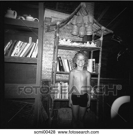 Stock Photo - standing, holidays, vacation, Thailand, child, girl, stand. Fotosearch